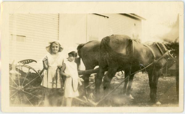 Two Children by a Horse Drawn Plow