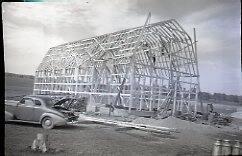 Men building a barn