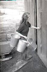 Woman with milk pails