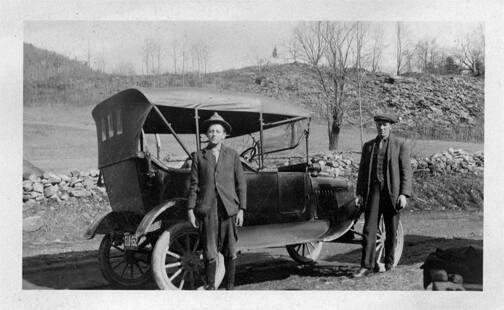 Two Men with Car 
