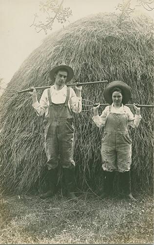 Floyd & Lillian Davenport in front of a Haystack