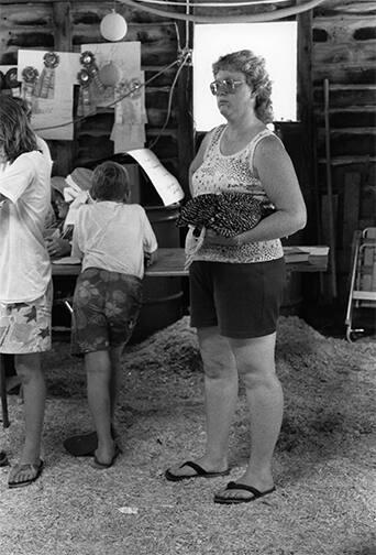 Woman with Barred Rock Chicken, Otsego County Fair