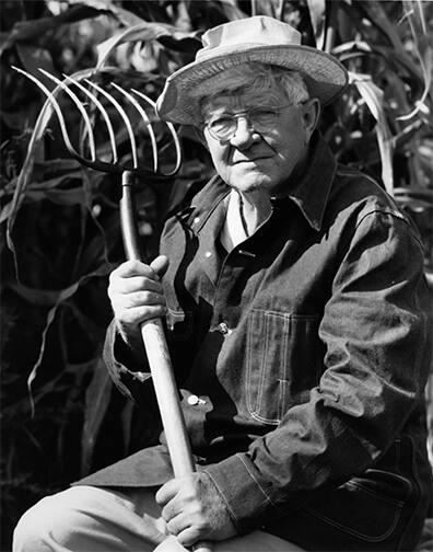 Farmer with Hayfork