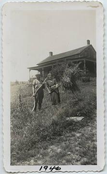 Woman and Man with Farm Implements