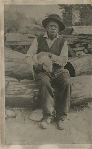 Man Holding Piglet
