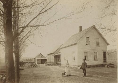 Man and Woman Outside Homestead
