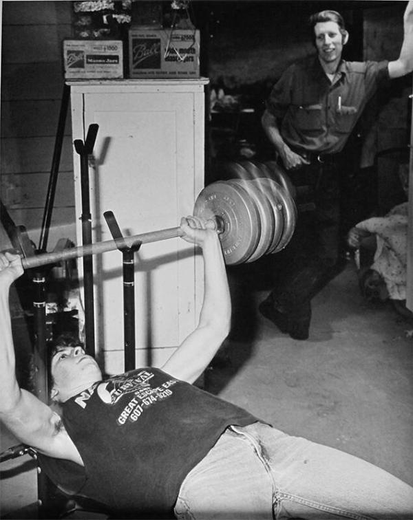 John with Scott Lifting Weights