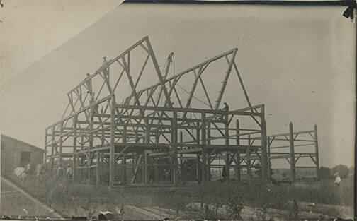 Raising the Trusses of a Barn