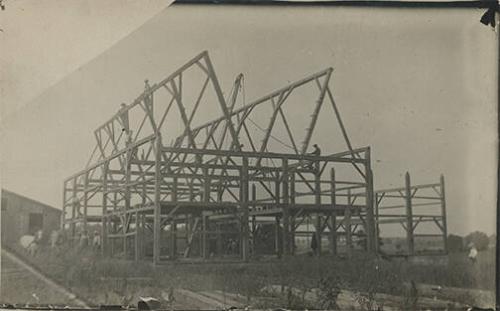 Raising the Trusses of a Barn