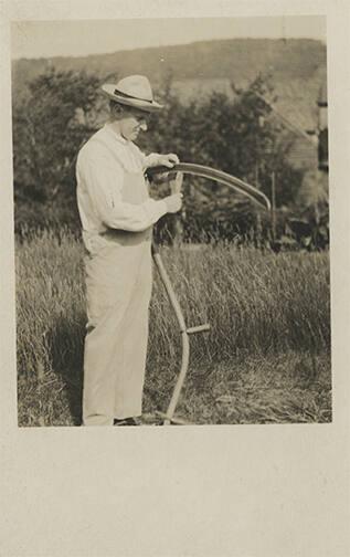 Farmer Sharpening a Scythe