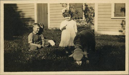Three Children and a Sheep
