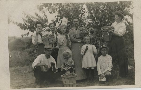 A Group with their Apple Harvest