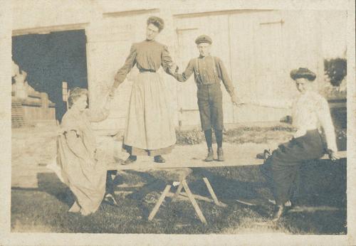 Women and Child on Plank