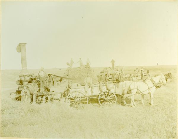 Men Threshing in a Field