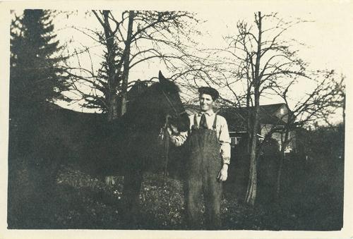 Man Posing with Horse