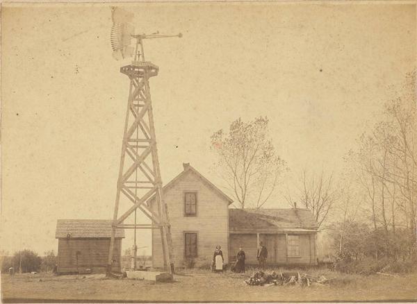Family with Home and Monitor Windmill