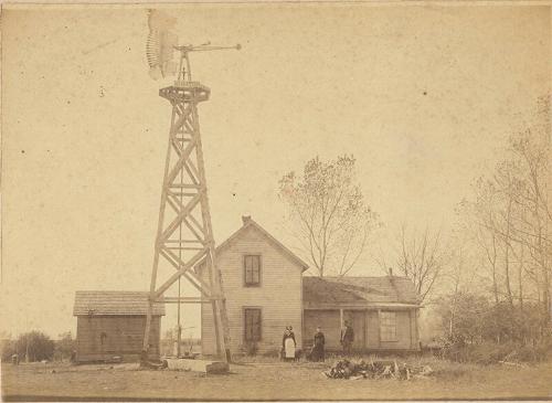 Family with Home and Monitor Windmill