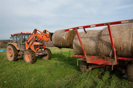 Tractor and Hay Bale at G&T Farm