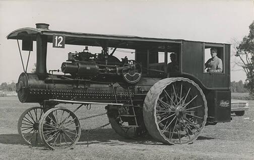 Men in Steam Powered Traction Engine