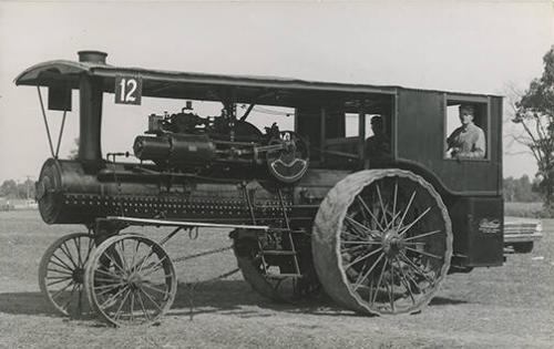 Men in Steam Powered Traction Engine