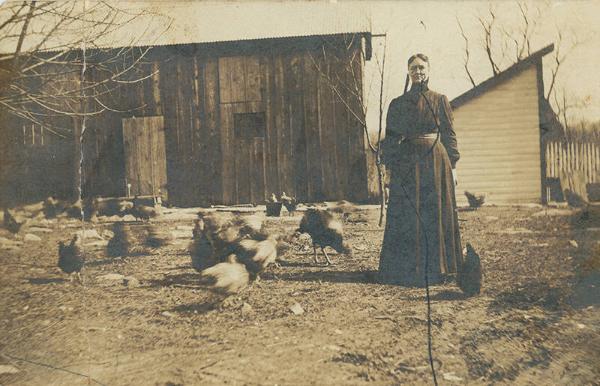 Woman with Brood of Chickens