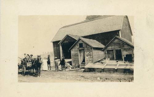 Family with Horses and Barn