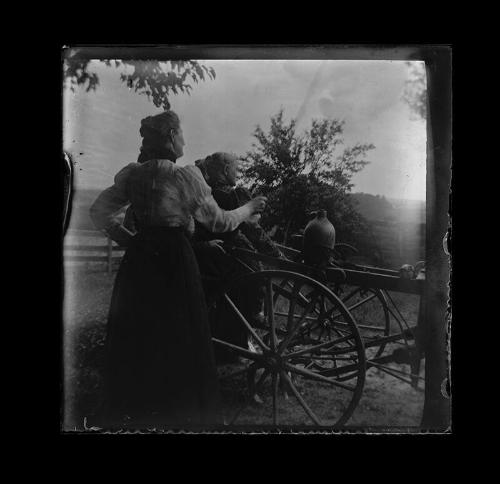 Women with Farm Equipment and Crock Jug