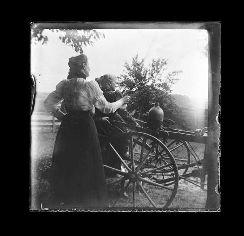 Women with Farm Equipment and Crock Jug