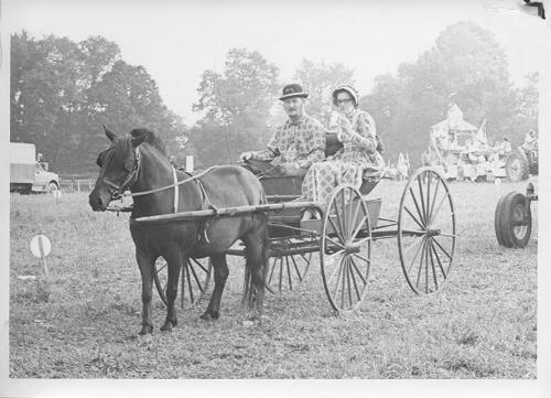 Bicentennial Celebration and Parade: Couple In Wagon