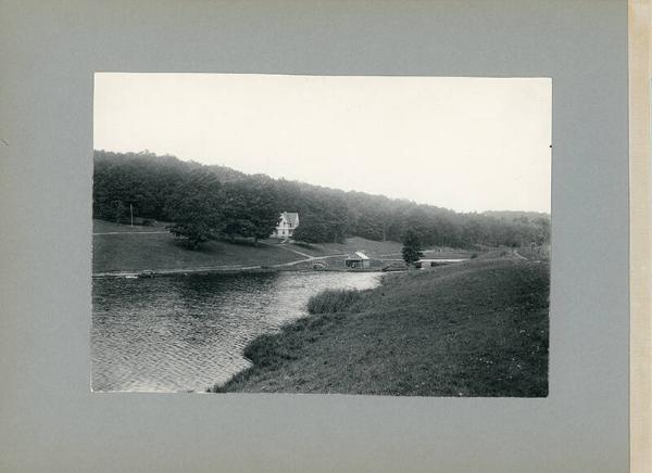 Farmhouse Near a Body of Water