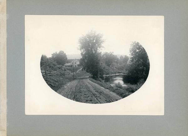 View of a Farm Down a Country Road