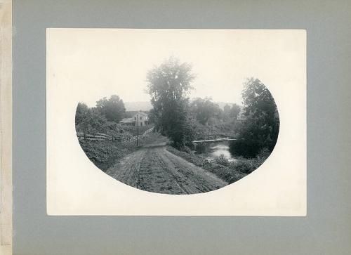 View of a Farm Down a Country Road
