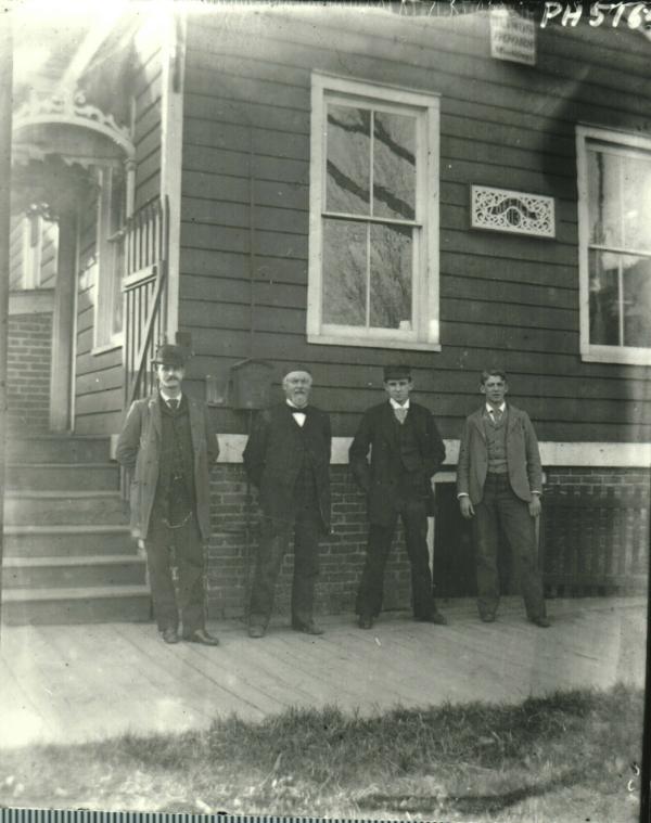 Men at James Young Lumber Yard