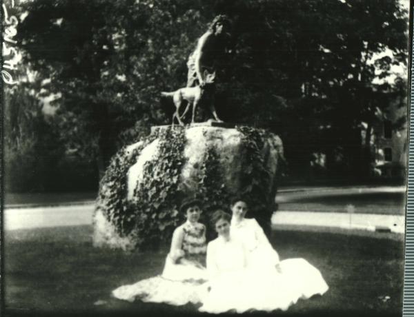 3 Women in Front of Hunter & Dog Statue