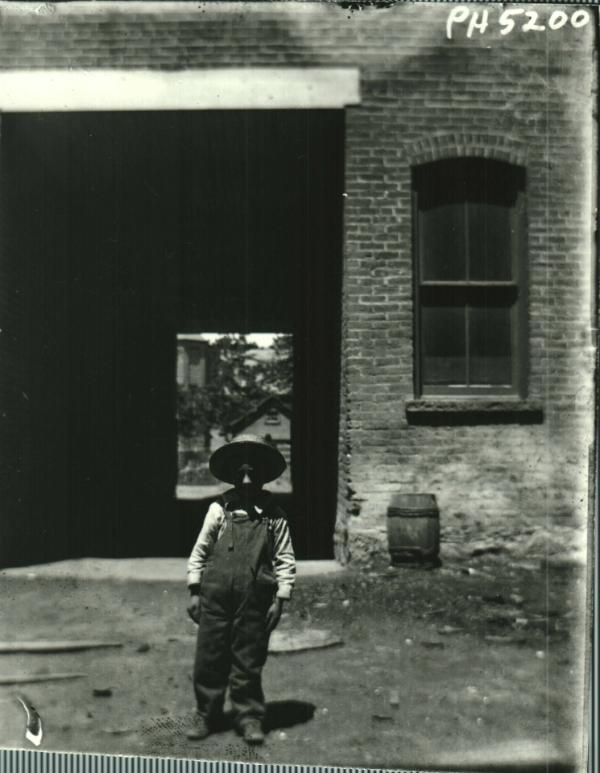 Boy in Overalls