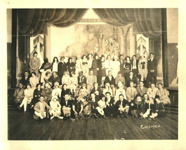 Costumed Group in Old Cooperstown Fire Hall Auditorium